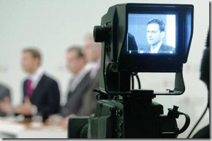 BONN, GERMANY - DECEMBER 6: T-Mobile CEO and Deutsche Telekom board member Hamid Akhavan is filmed by a camera monitor as he attends a news conference December 6, 2006 in Bonn, Germany. Deutsche Telekom presented the restructured Board of Management today. (Photo by Juergen Schwarz/Getty Images)